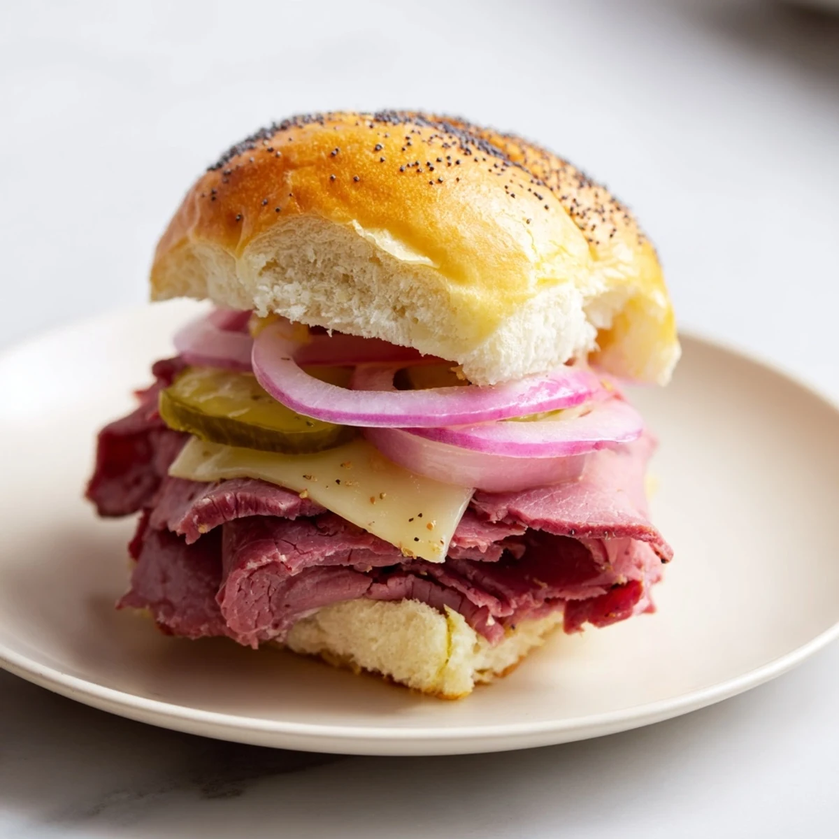 A close-up view shows these Corned Beef Sliders with Mustard served on a wooden board, perfect for a St. Patrick's Day party.