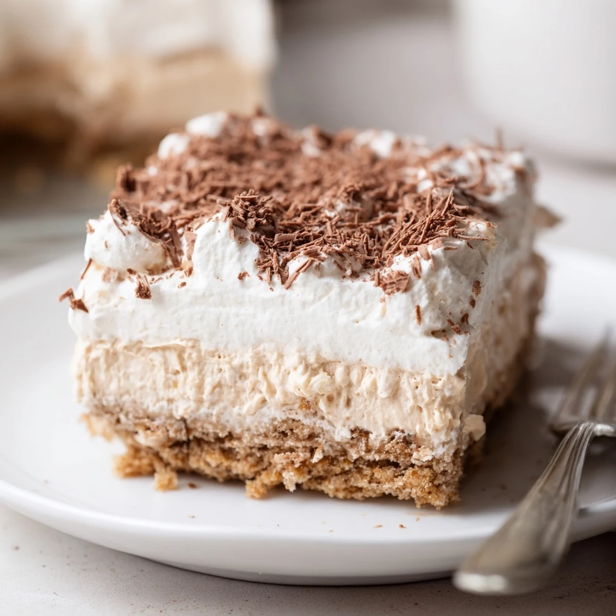 No Bake Layered Dessert with creamy vanilla layers, crunchy graham base