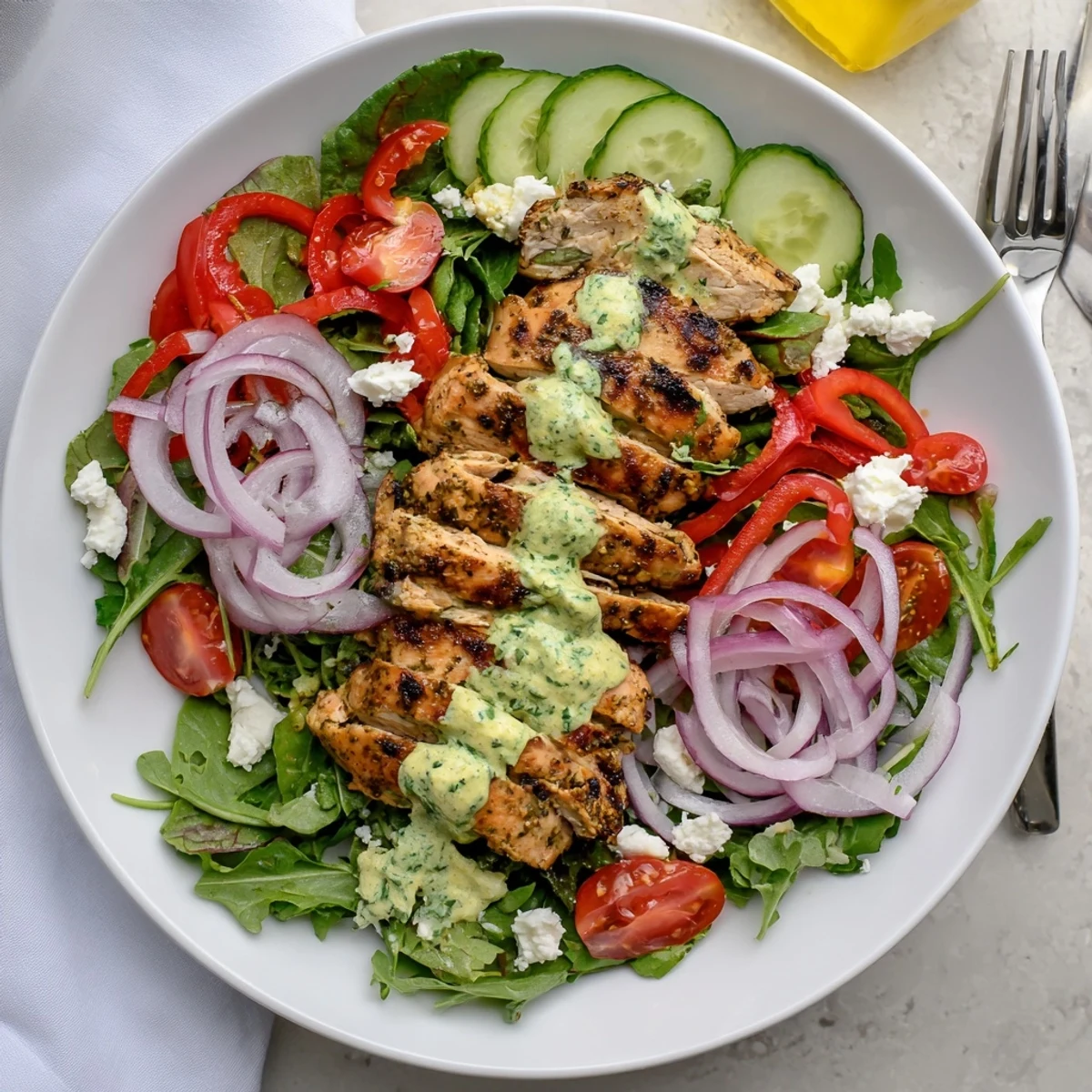 Smoky chicken slices, crisp vegetables, Grilled Chicken Salad Avocado Herb Dressing Recipe.
