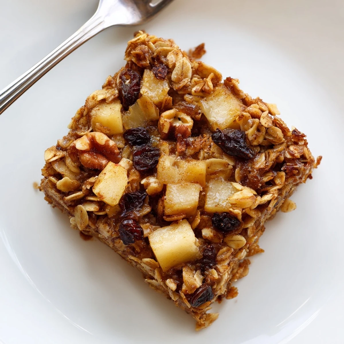 Delicious Apple Cinnamon Oatmeal Bake Recipe For Mornings steaming, golden with apple chunks