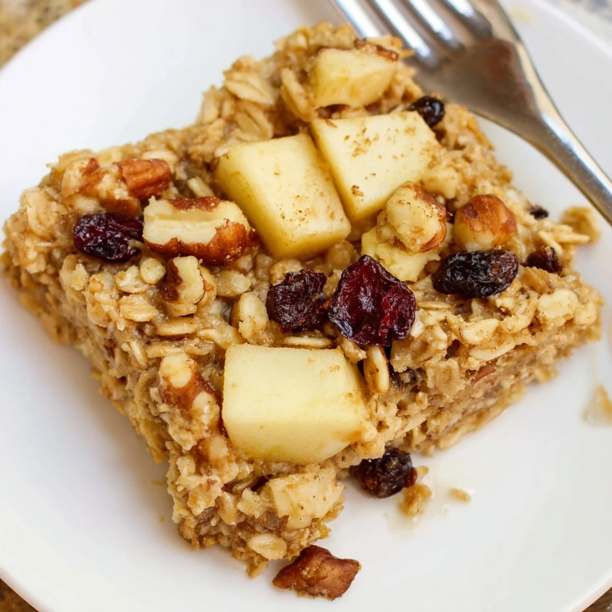 Delicious Apple Cinnamon Oatmeal Bake Recipe For Mornings baked until caramelized, nut-crisp topping