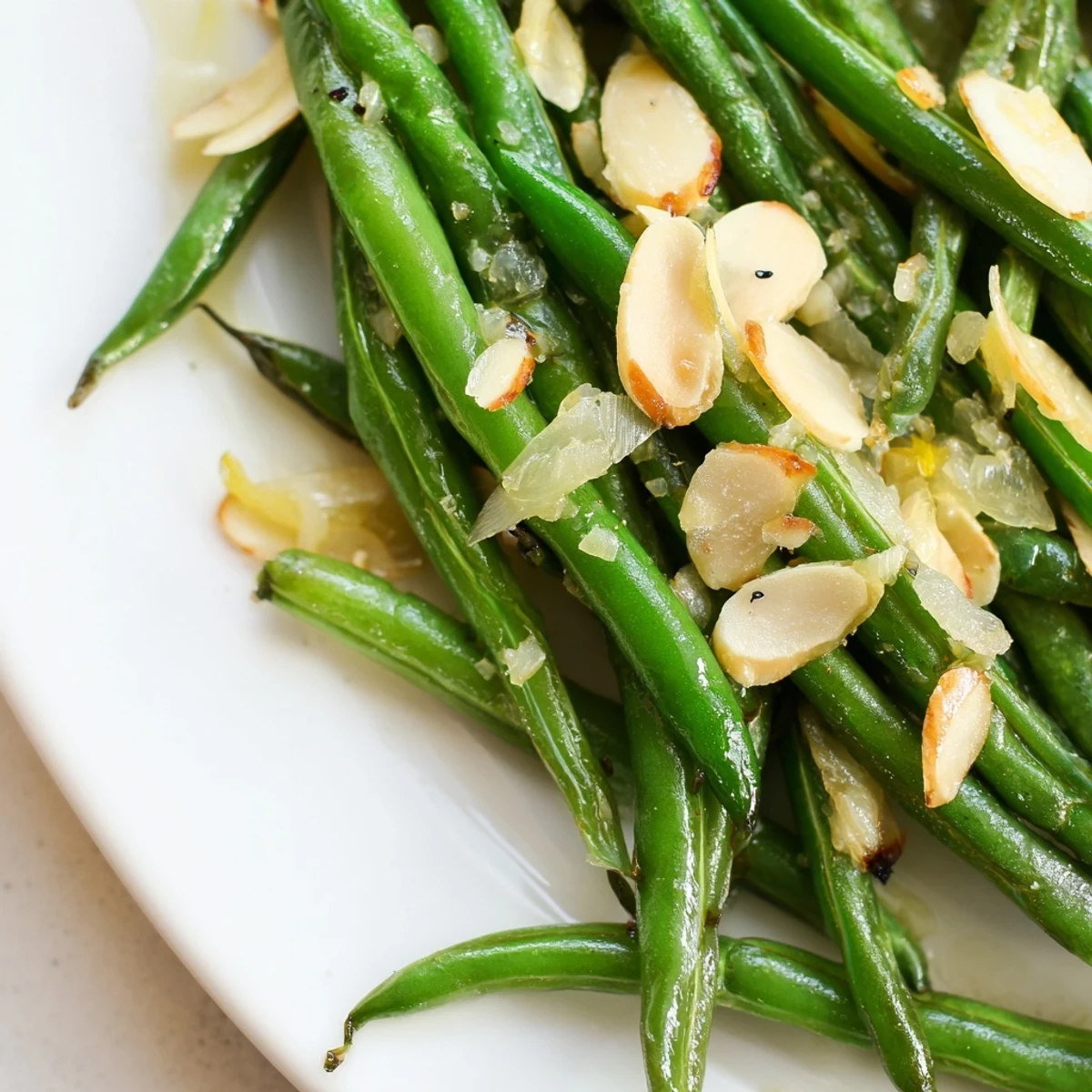 Vibrant green beans cooked in garlic olive oil, a crisp vegetable side dish ready to serve