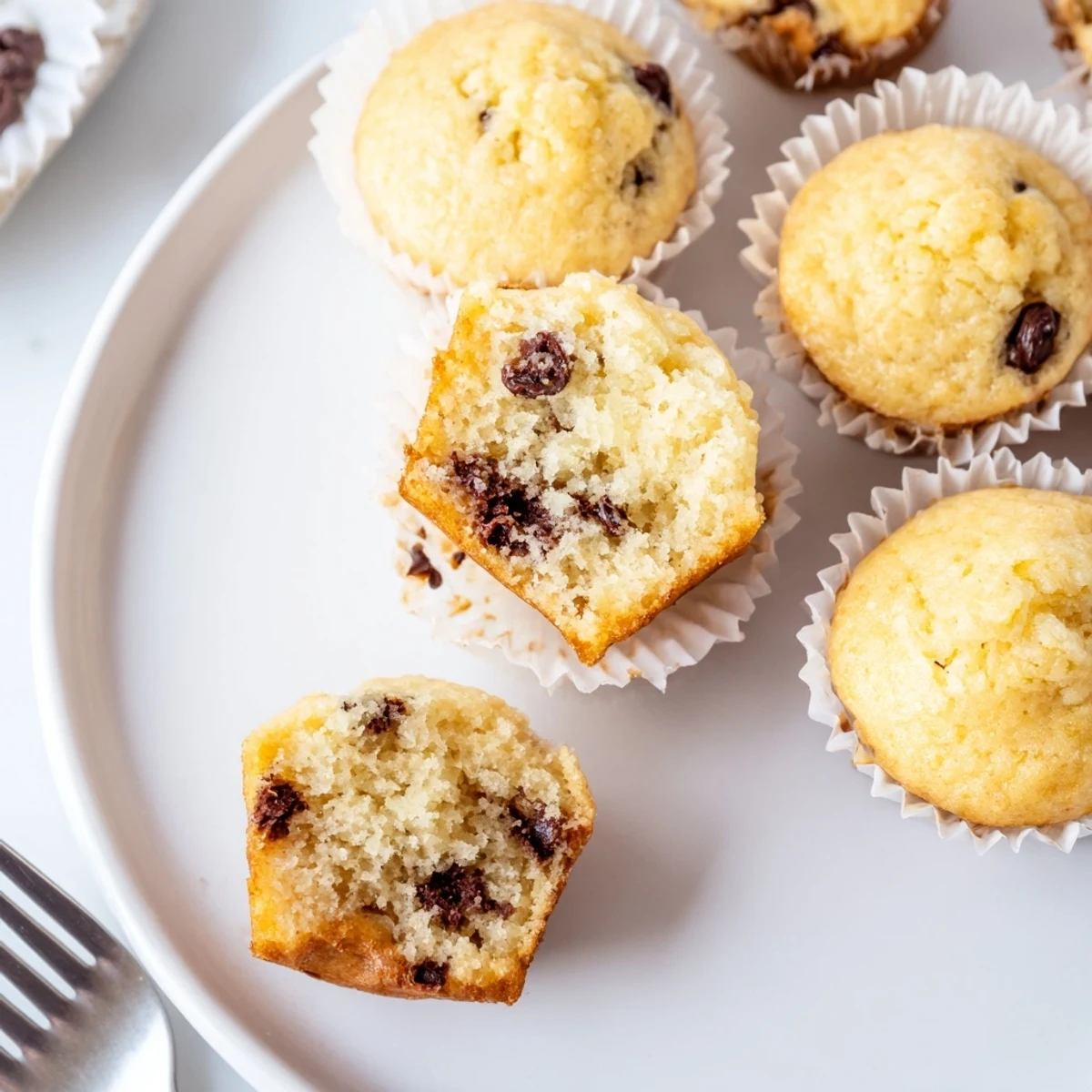 After-bake cooling rack holding Little Bites Mini Muffins, tender crumb, handheld snack